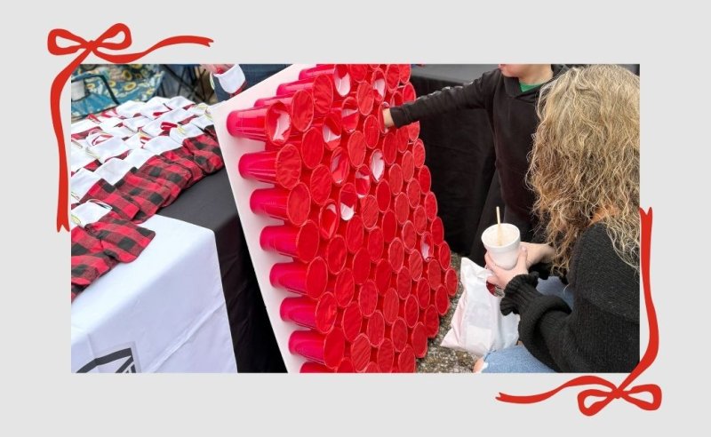 Children Enjoying Punch Board at Annual Candy Cane Lane Event in Gilmer, Texs